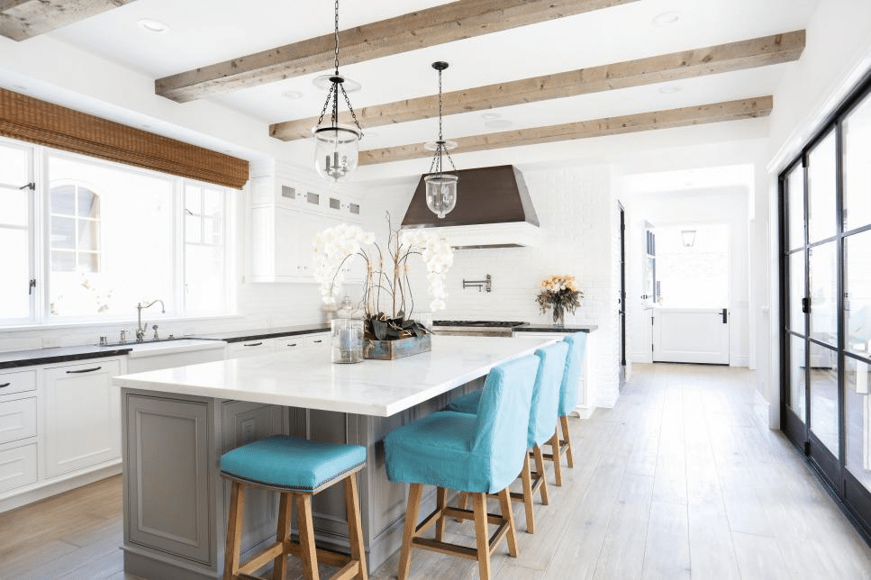Coastal kitchen with custom island and cabinetry
